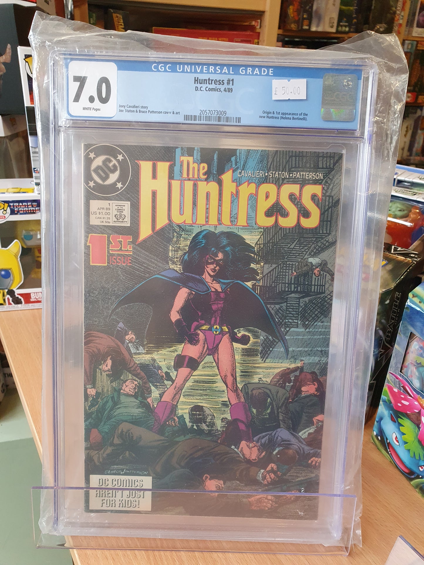 The Huntress #1 - CGC Graded 7.0 - Origin & 1st appearance of the new Huntress (Helena Bertinelli)